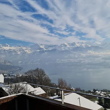 With View Of The Mountains And The Thun Шале *